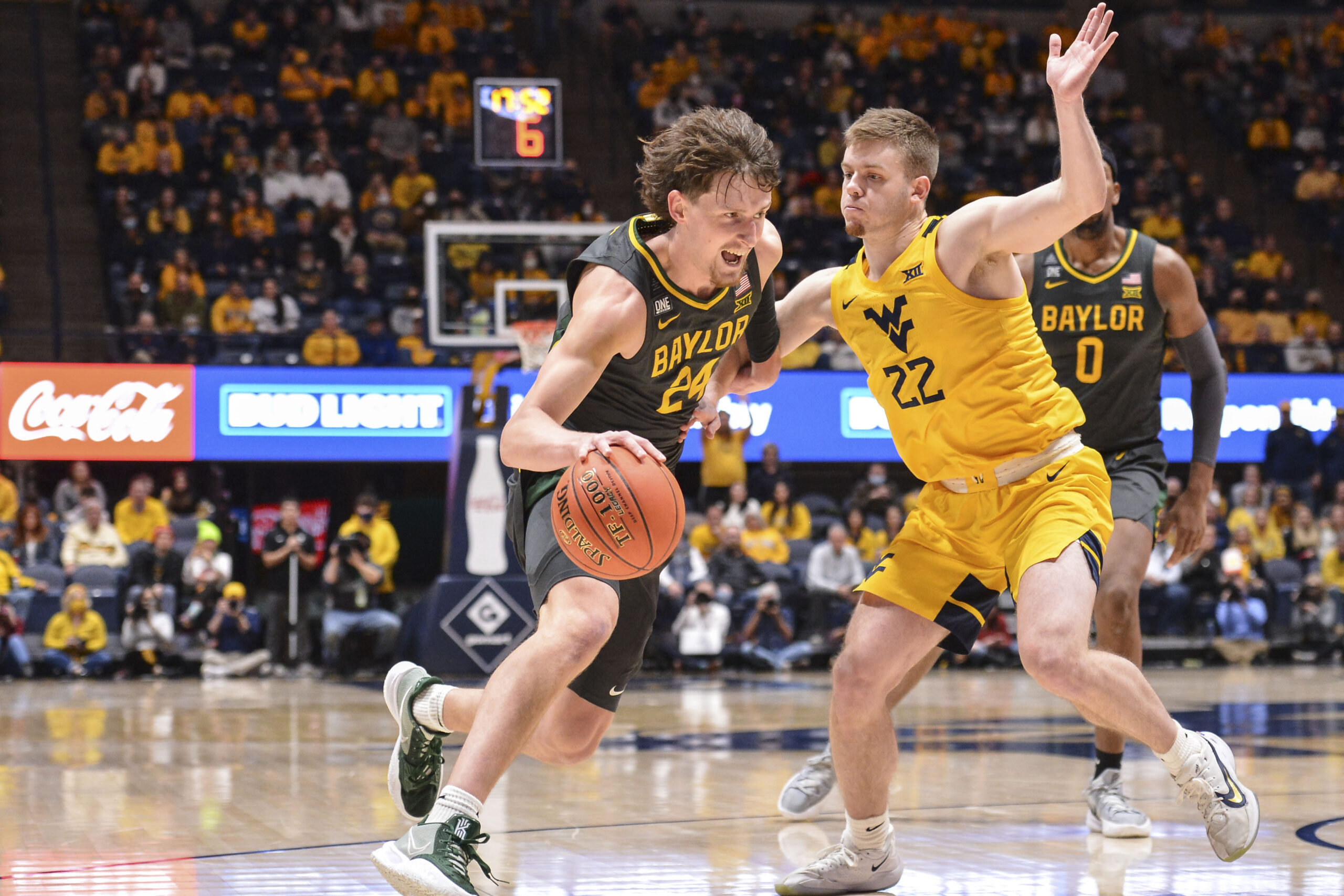 Against the Big 12's Big Two, West Virginia finds how far it must climb